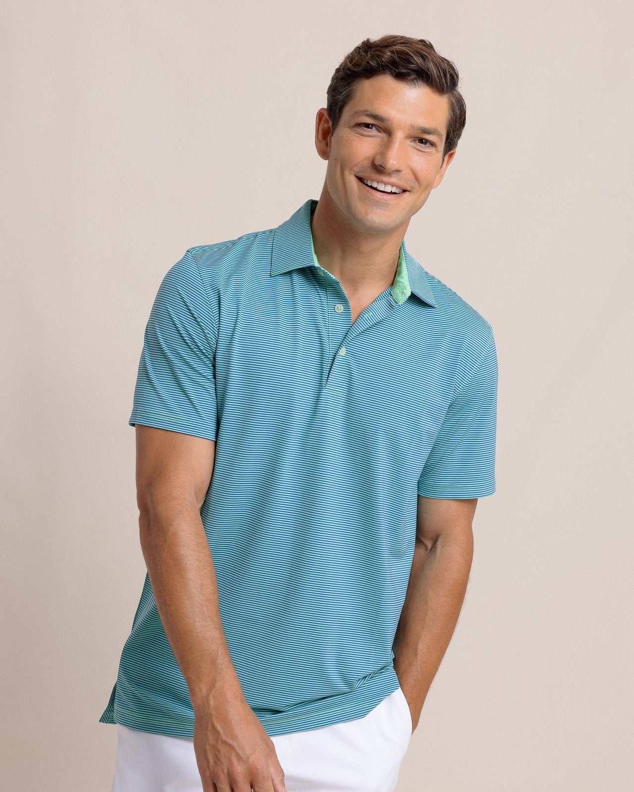 The front view of the Southern Tide brrr-eeze Meadowbrook Stripe Polo by Southern Tide - Parakeet