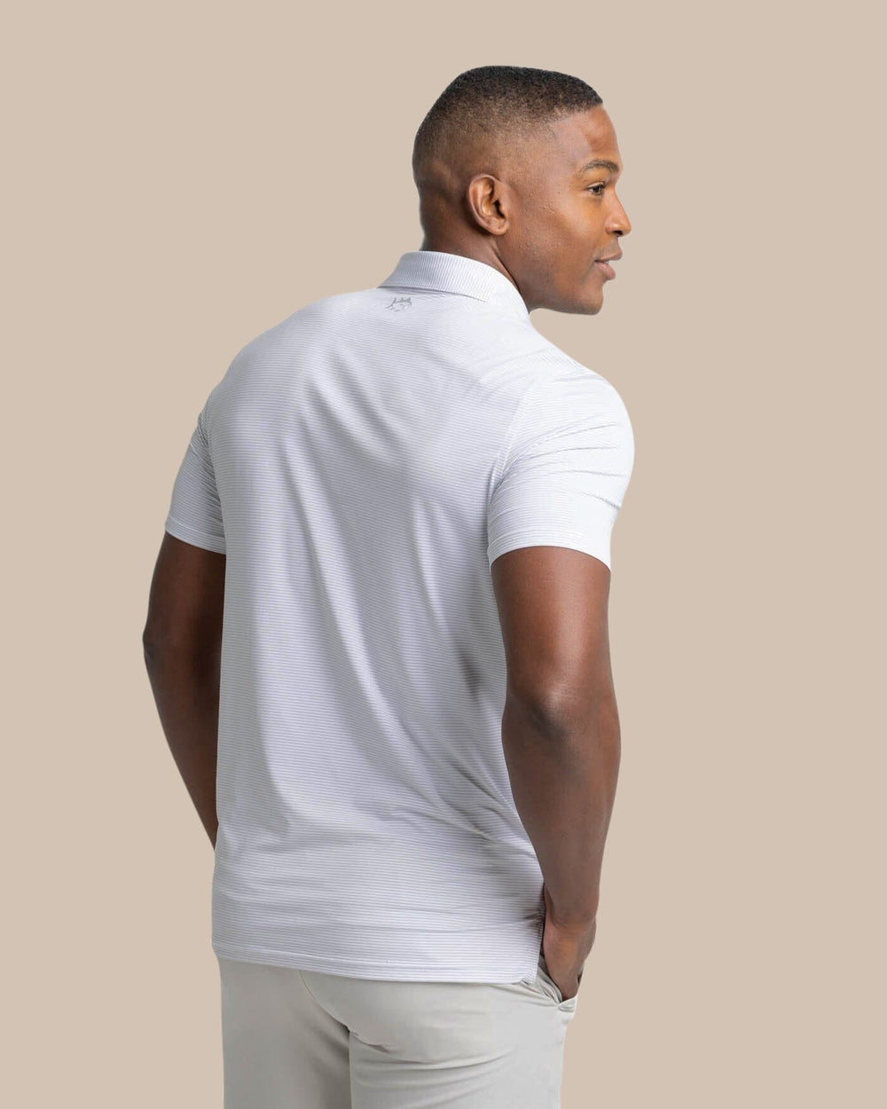 The back view of the Southern Tide brrr-eeze Meadowbrook Stripe Polo by Southern Tide - Platinum Grey