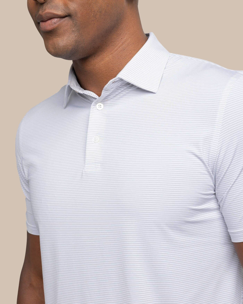The detail view of the Southern Tide brrr-eeze Meadowbrook Stripe Polo by Southern Tide - Platinum Grey