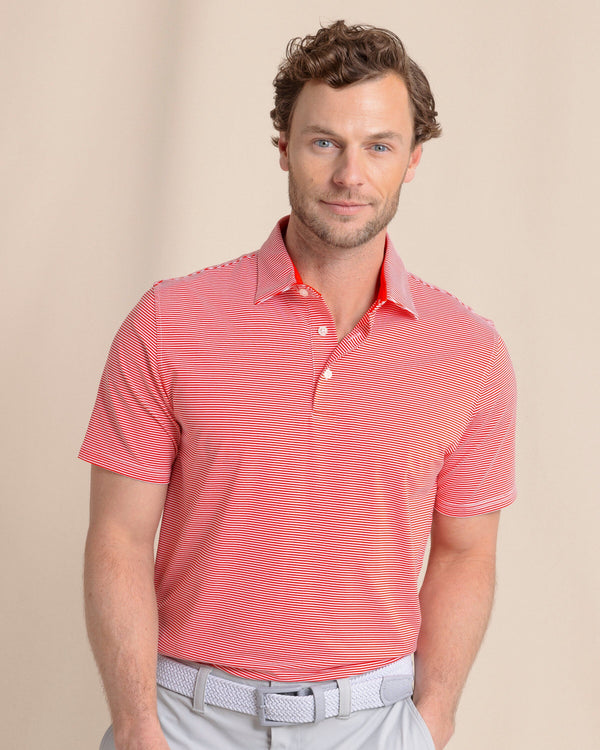 The front view of the Southern Tide brrr°®-eeze Meadowbrook Stripe Polo by Southern Tide - Poppy Red