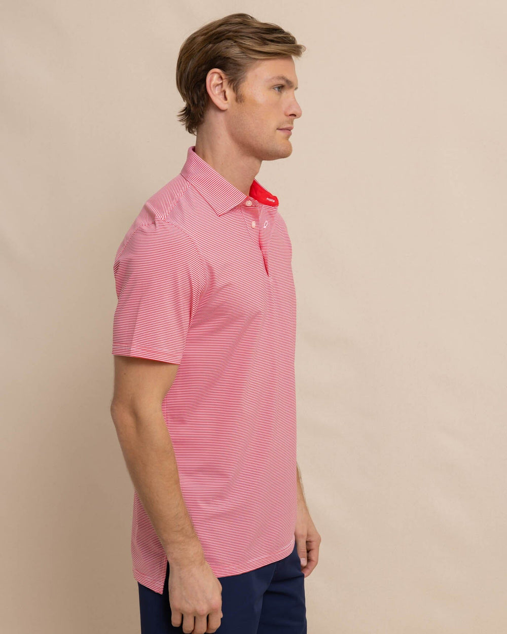 The front view of the Southern Tide brrr-eeze-meadowbrook-stripe-polo by Southern Tide - Teaberry Pink