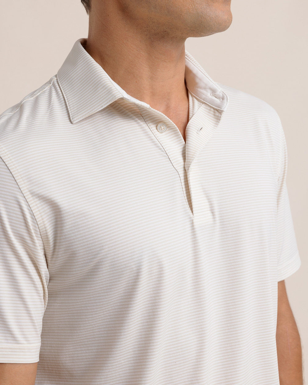 The collar view of the Southern Tide brrr-eeze Meadowbrook Stripe Polo by Southern Tide - Sand White