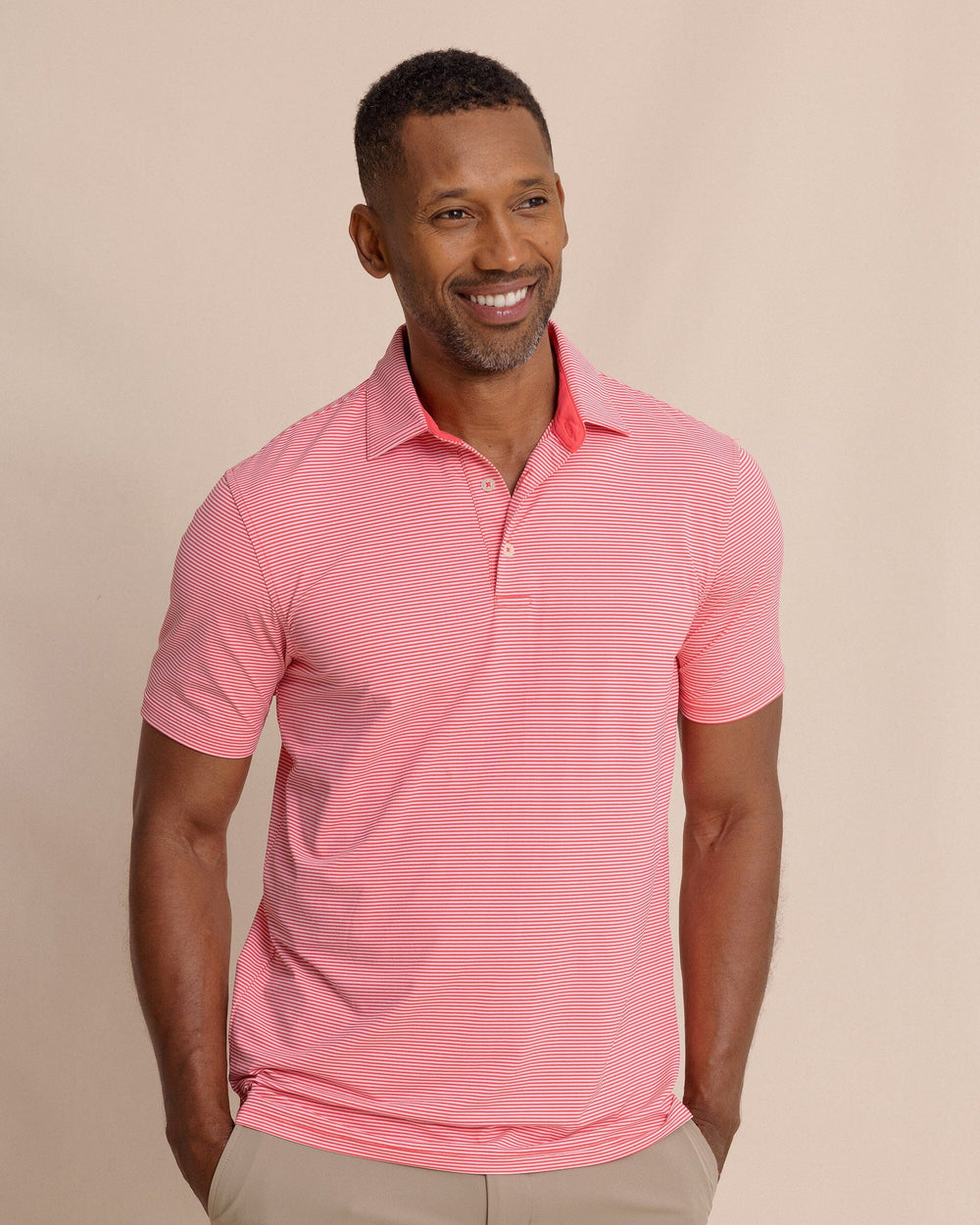 The front view of the Southern Tide brrr°®-eeze Meadowbrook Stripe Polo by Southern Tide - Snapper