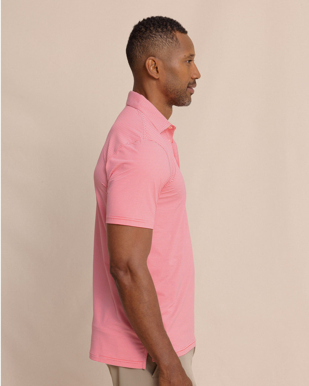 The side view of the Southern Tide brrr°®-eeze Meadowbrook Stripe Polo by Southern Tide - Snapper