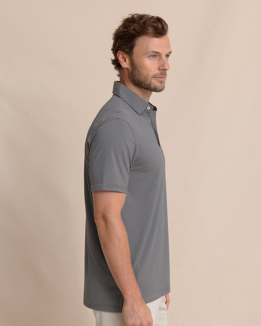 The side view of the Southern Tide brrr°®-eeze Meadowbrook Stripe Polo by Southern Tide - Steel