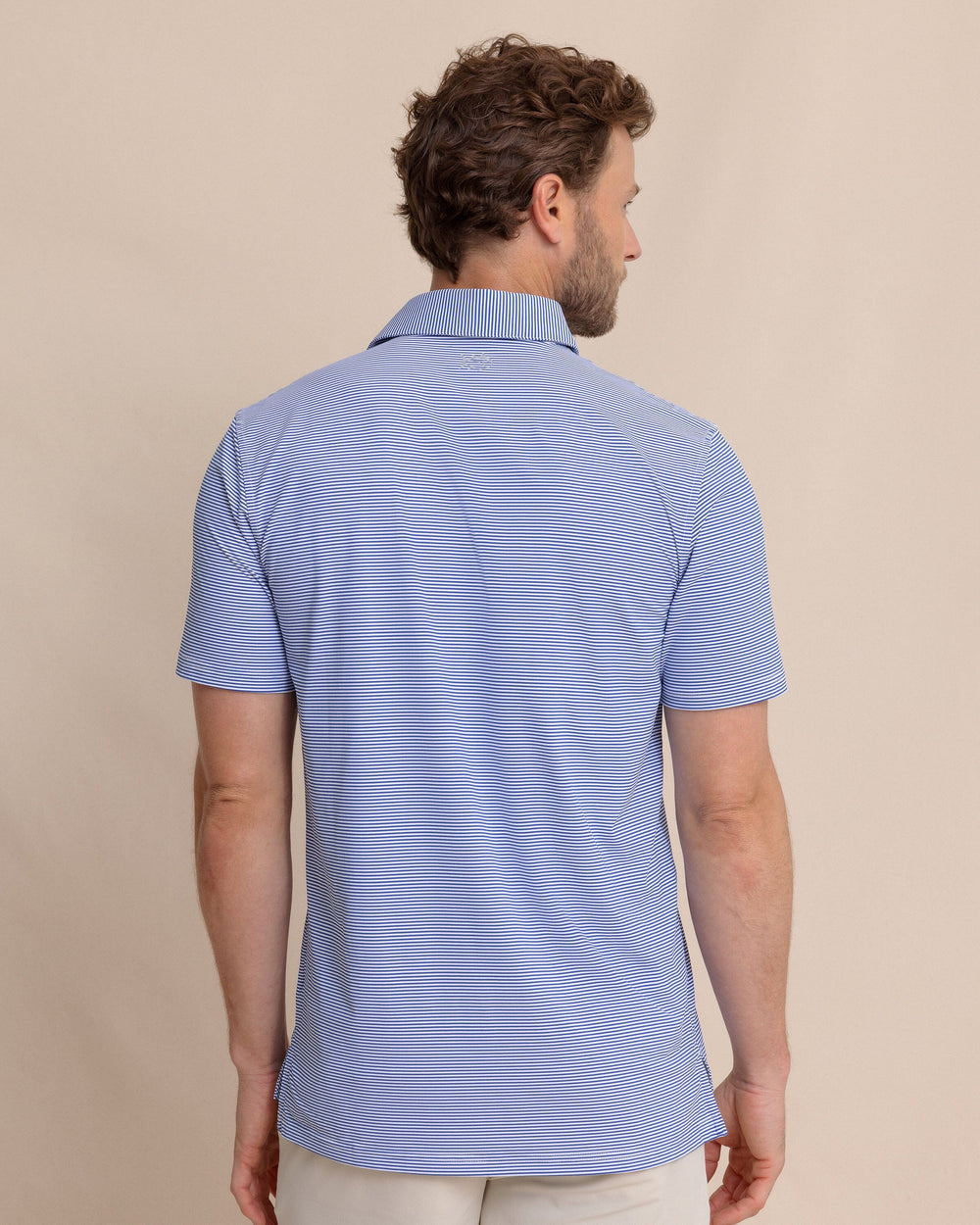 The back view of the Southern Tide brrr°®-eeze Meadowbrook Stripe Polo by Southern Tide - Surf Blue