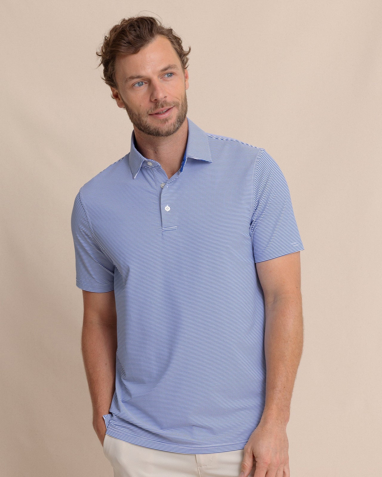 The front view of the Southern Tide brrr°®-eeze Meadowbrook Stripe Polo by Southern Tide - Surf Blue
