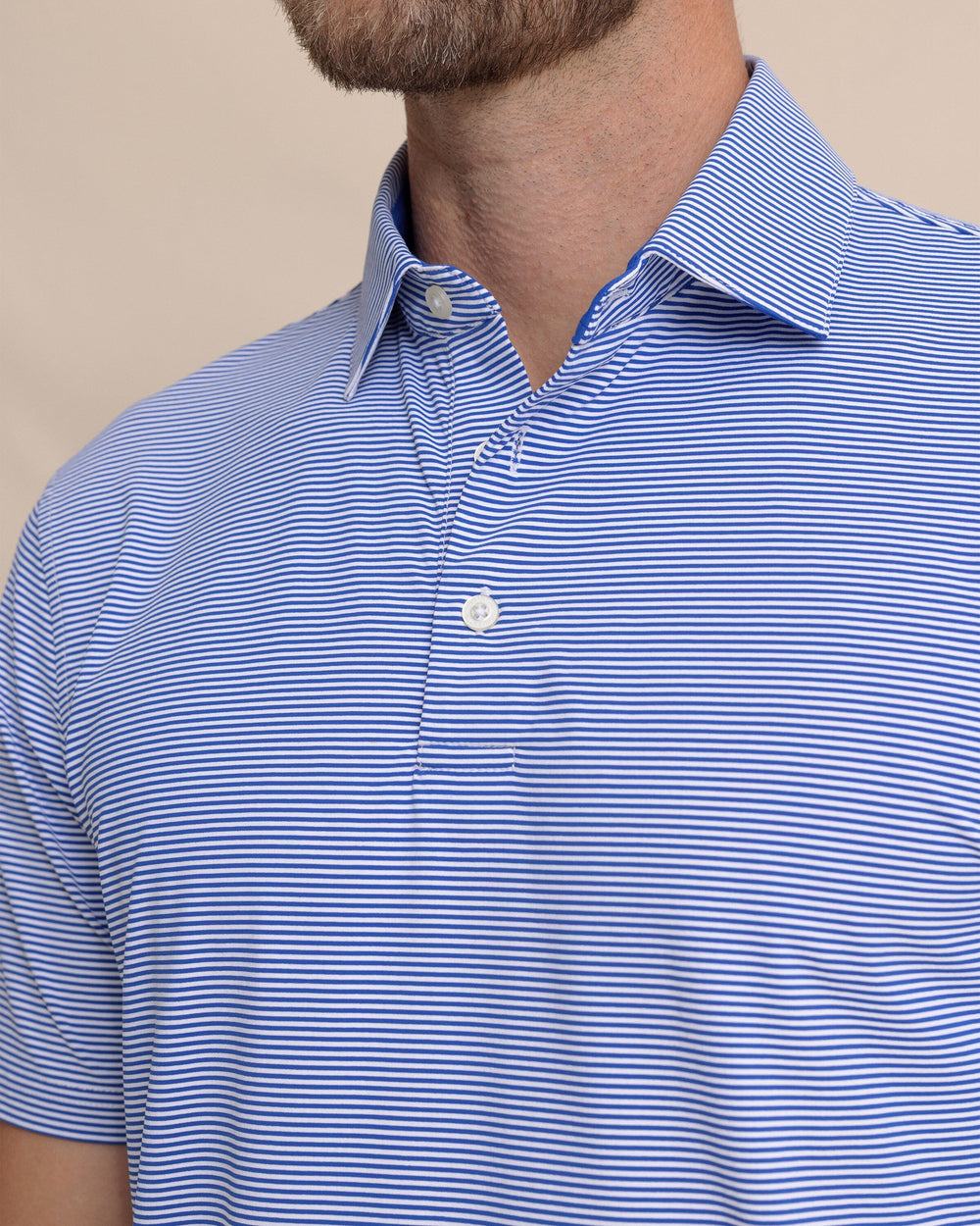The detail view of the Southern Tide brrr°®-eeze Meadowbrook Stripe Polo by Southern Tide - Surf Blue