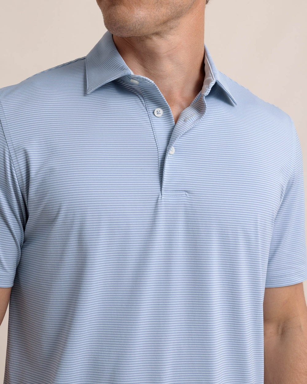 The detail view of the Southern Tide brrr-eeze Meadowbrook Stripe Polo by Southern Tide - Triumph Blue