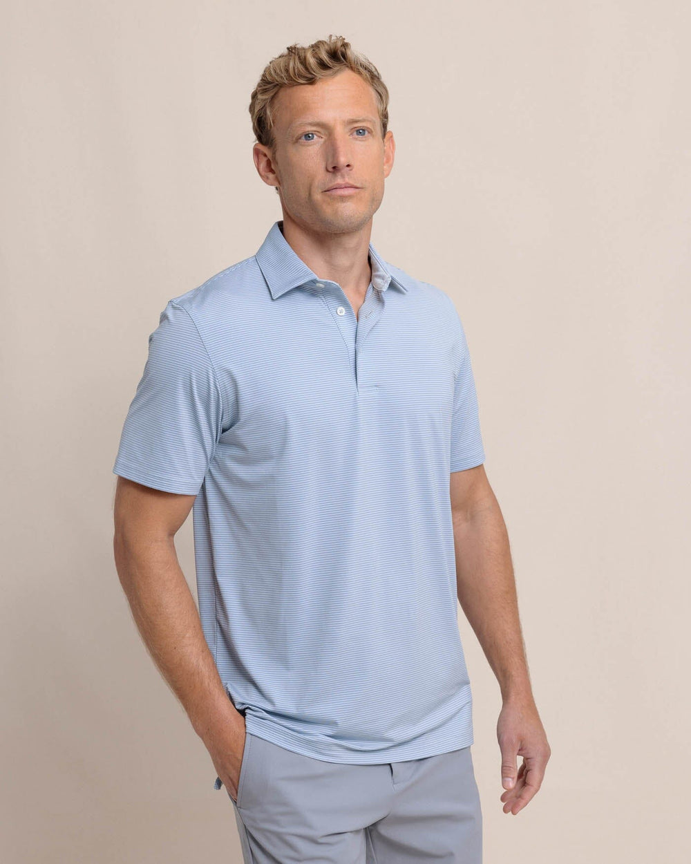The front view of the Southern Tide brrr-eeze Meadowbrook Stripe Polo by Southern Tide - Triumph Blue