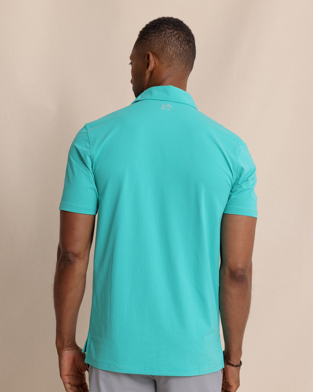 The back view of the Southern Tide brrr°®-eeze Meadowbrook Stripe Polo by Southern Tide - Turtle Green