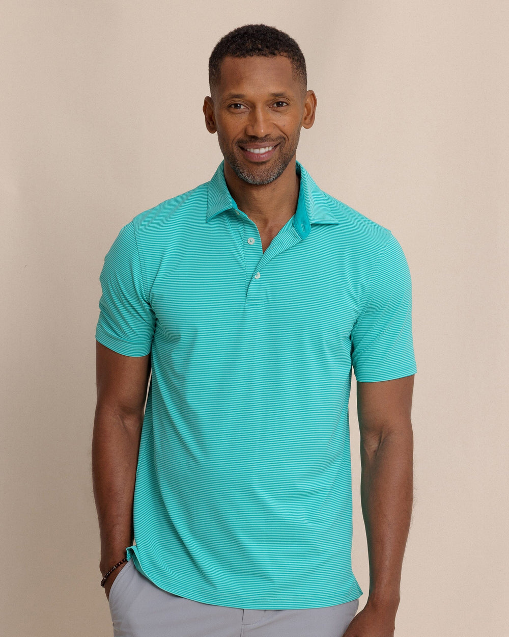 The front view of the Southern Tide brrr°®-eeze Meadowbrook Stripe Polo by Southern Tide - Turtle Green