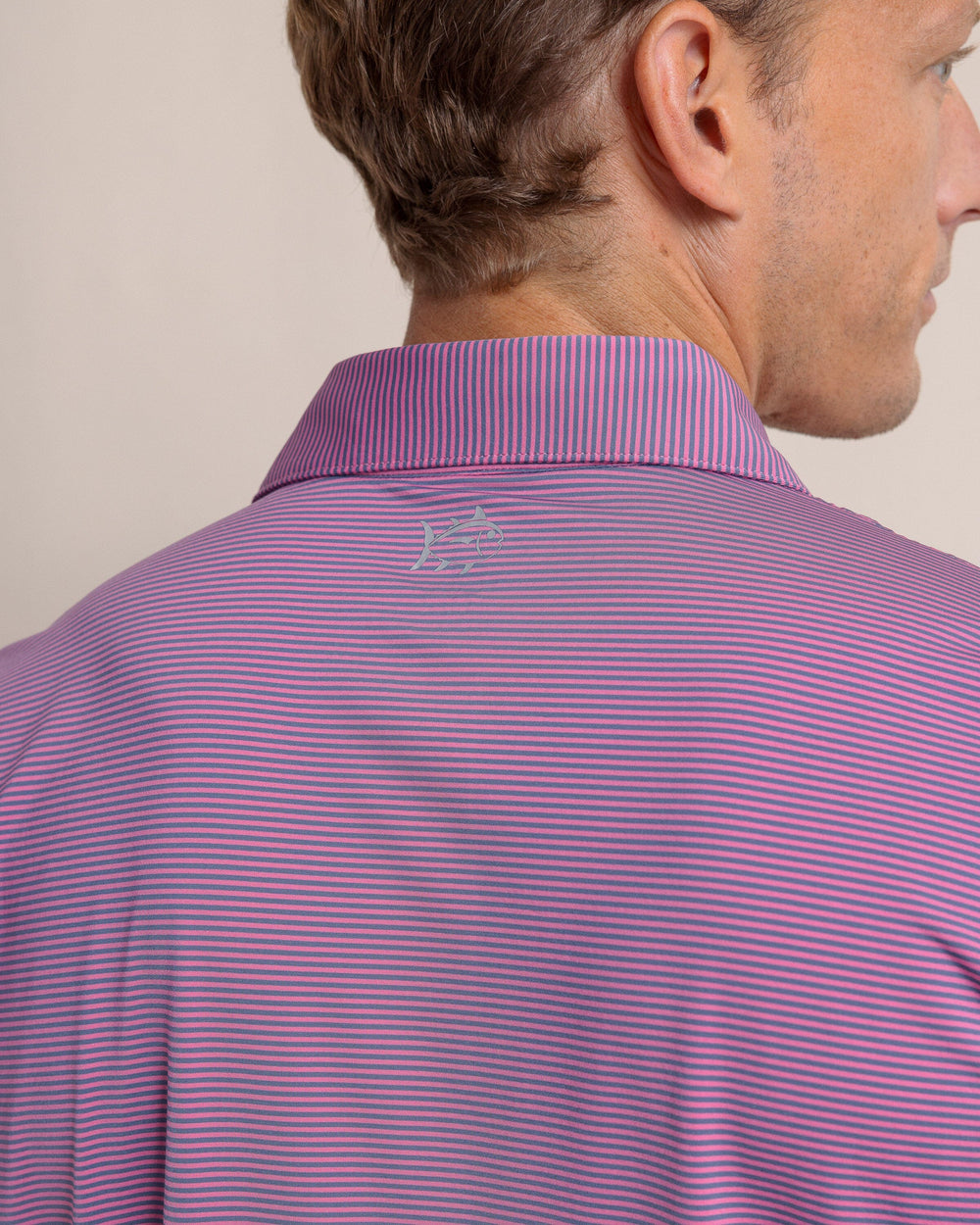 The back detail view of the Southern Tide brrr-eeze Meadowbrook Stripe Polo by Southern Tide - Very Berry