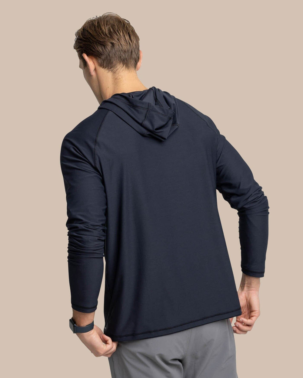 The back view of the Southern Tide brrr-illiant Performance Hoodie by Southern Tide - Caviar Black