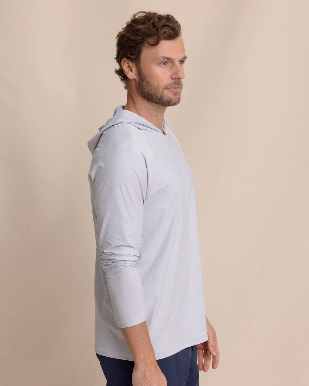 The side view of the Southern Tide brrr°®-illiant Performance Hoodie by Southern Tide - Platinum Grey