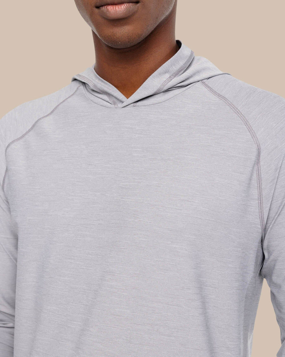 The detail view of the Southern Tide brrr°®-illiant Performance Hoodie by Southern Tide - Steel Grey