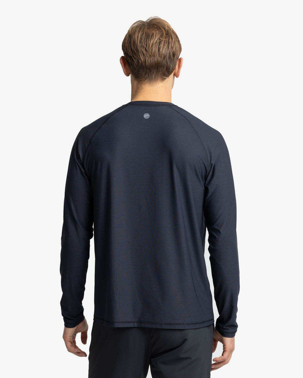 The back view of the Southern Tide brrr-illiant Performance Long Sleeve T-Shirt by Southern Tide - Caviar Black