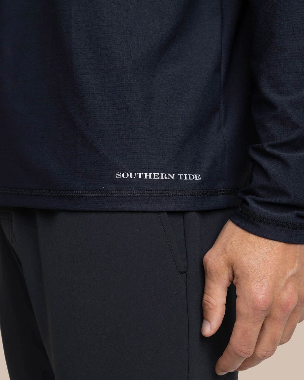 The label view of the Southern Tide brrr-illiant Performance Long Sleeve T-Shirt by Southern Tide - Caviar Black