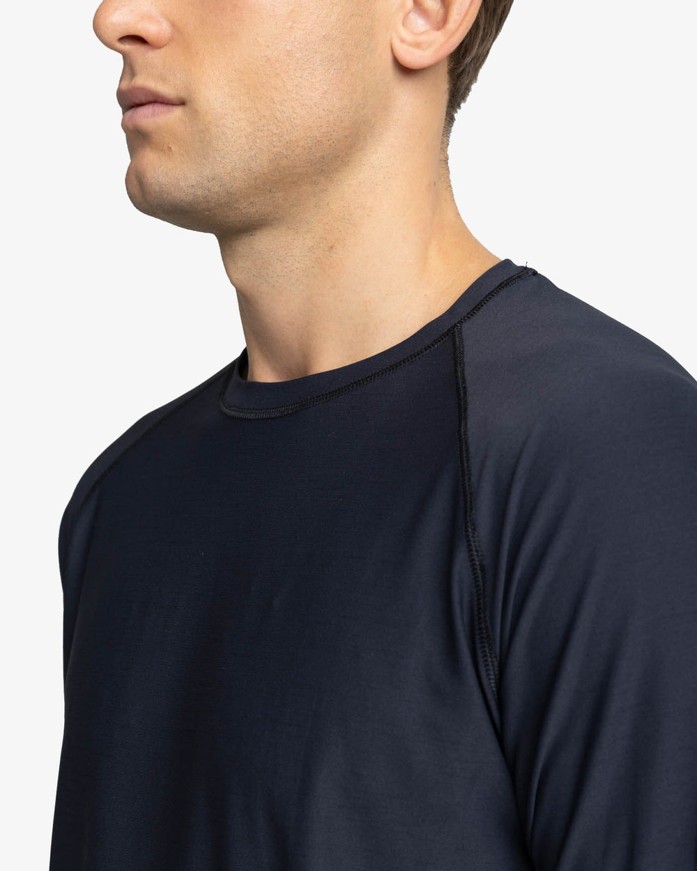 The detail view of the Southern Tide brrr-illiant Performance Long Sleeve T-Shirt by Southern Tide - Caviar Black