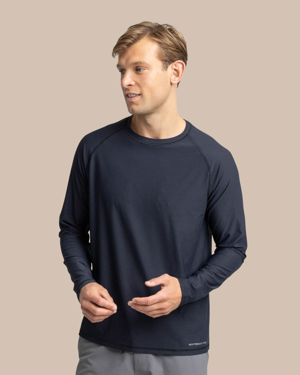 The front view of the Southern Tide brrr-illiant Performance Long Sleeve T-Shirt by Southern Tide - Caviar Black