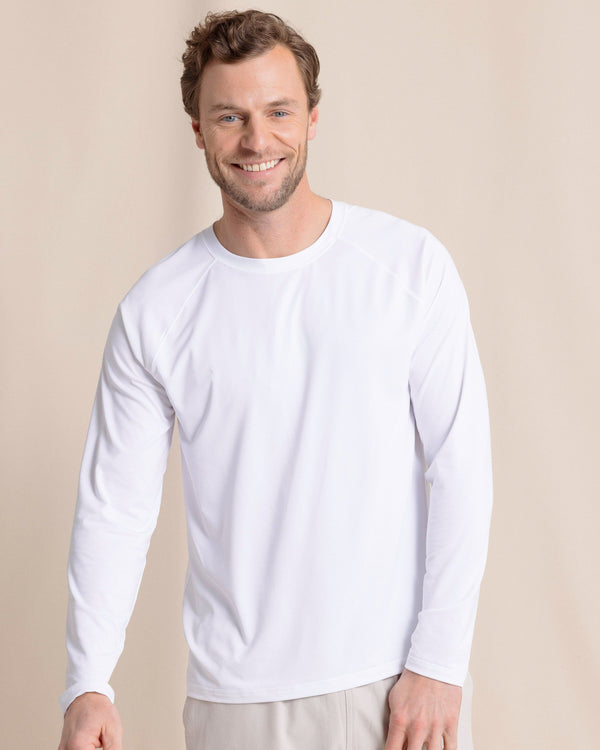 The front view of the Southern Tide brrr°®-illiant Performance Long Sleeve T-Shirt by Southern Tide - Classic White