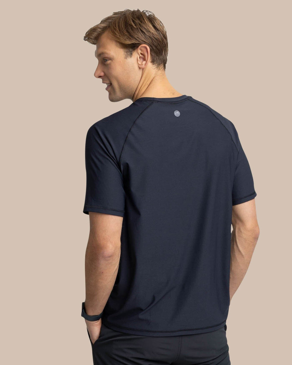 The back view of the Southern Tide brrr-illiant Performance T-Shirt by Southern Tide - Caviar Black