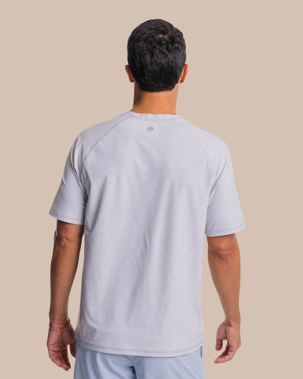 The back view of the Southern Tide brrr°®-illiant Performance Tee by Southern Tide - Platinum Grey