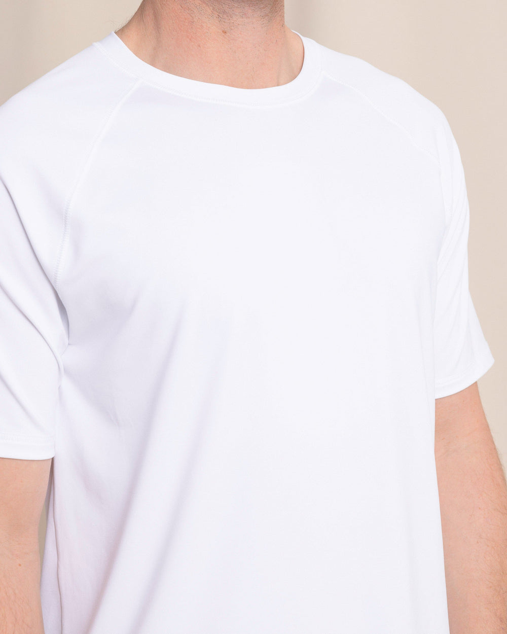 The front detail view of the Southern Tide brrr°®-illiant Performance T-Shirt by Southern Tide - Classic White