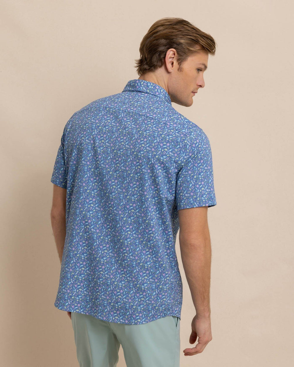 The back view of the Southern Tide brrr Intercoastal Dazed and Transfused Short Sleeve Sport Shirt by Southern Tide - Coronet Blue