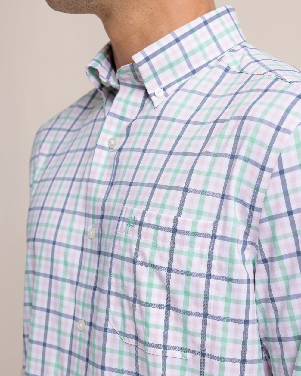 The detail view of the Southern Tide Brrr Intercoastal Glenmoor Plaid Long Sleeve Sport Shirt by Southern Tide - Parfait Pink