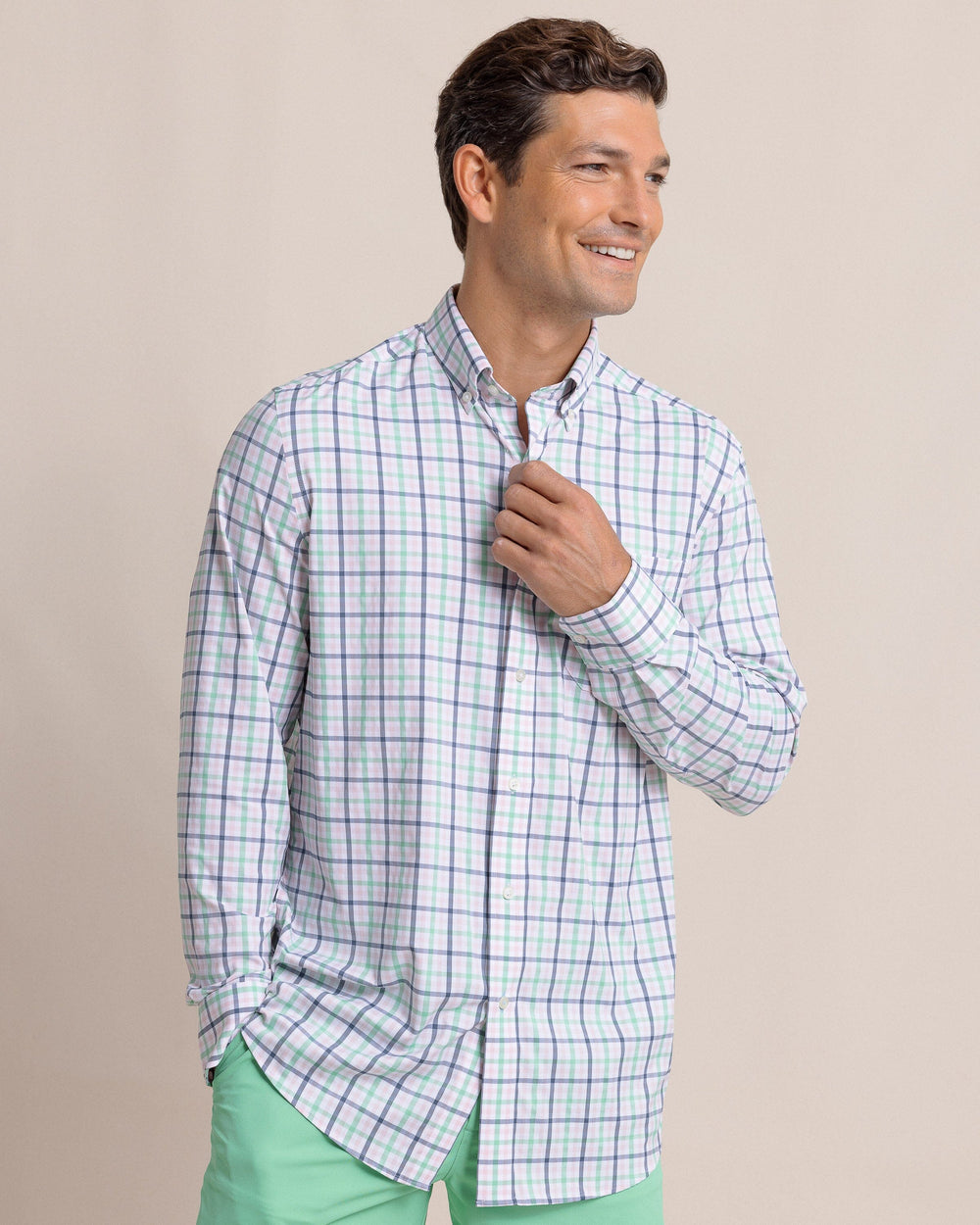 The front view of the Southern Tide Brrr Intercoastal Glenmoor Plaid Long Sleeve Sport Shirt by Southern Tide - Parfait Pink