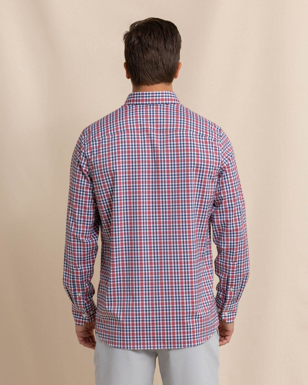 The back view of the Southern Tide Brrr Intercoastal Haywood Plaid Sport Shirt by Southern Tide - Mineral Red