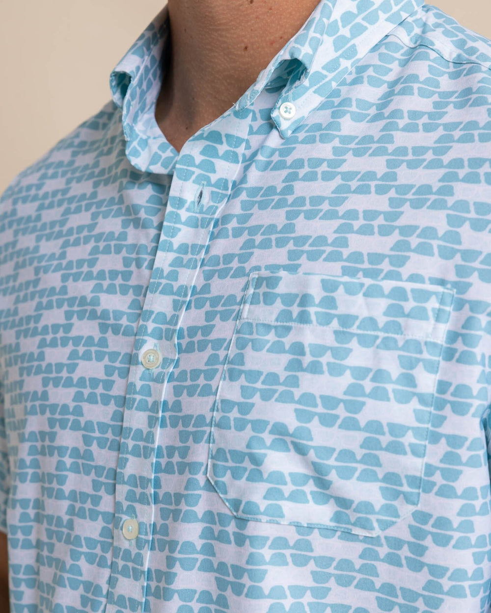 The detail view of the Southern Tide brrr Intercoastal Heather Stay Shady Short Sleeve Sport Shirt by Southern Tide - Heather Wake Blue