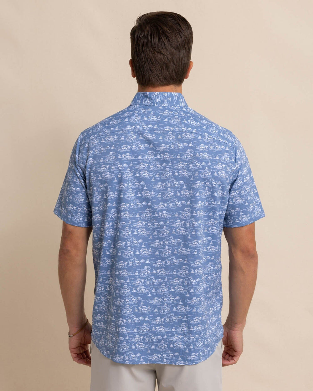 The back view of the Southern Tide brrr Intercoastal Sunset Beach Short Sleeve SportShirt by Southern Tide - Coronet Blue