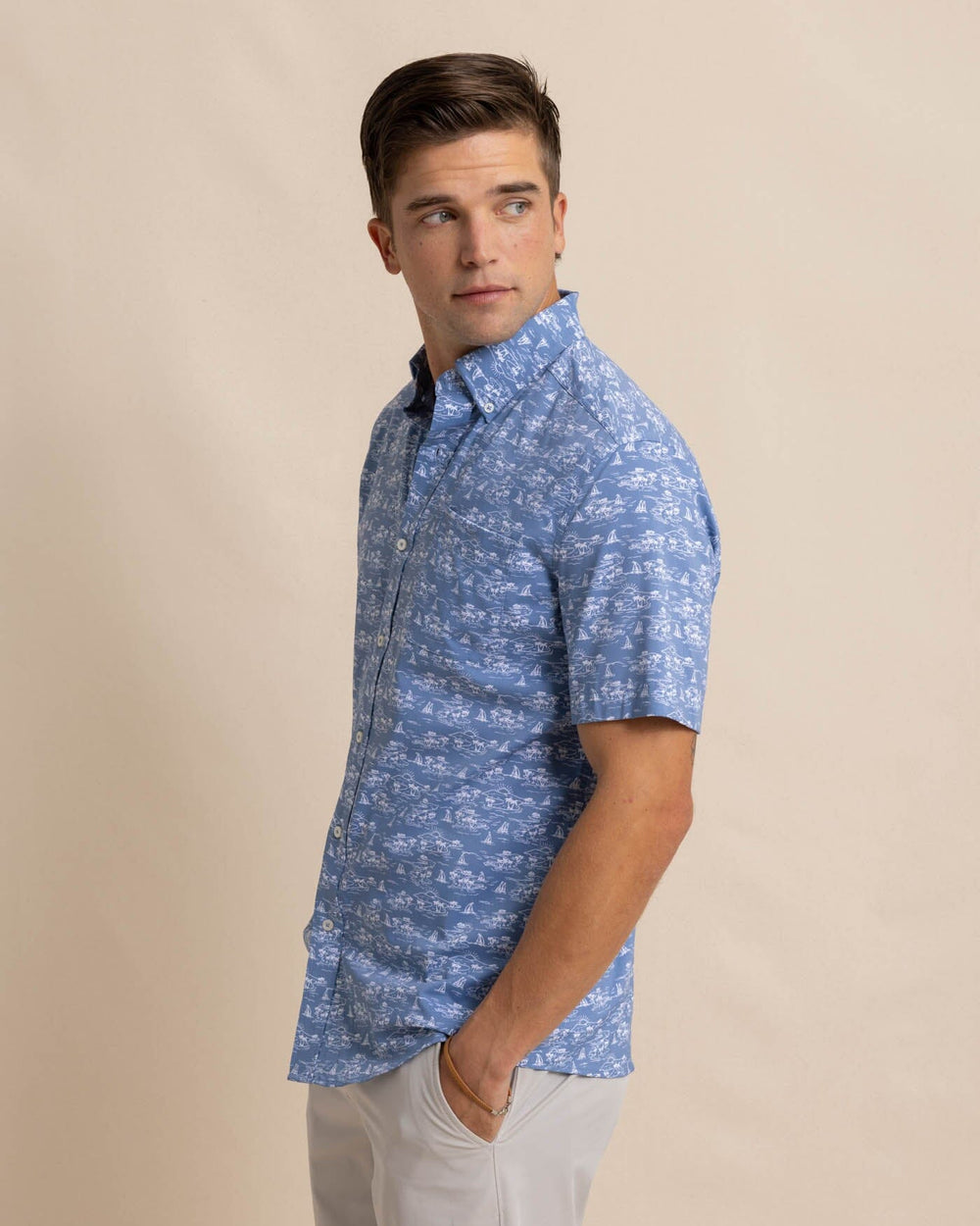 The front view of the Southern Tide brrr Intercoastal Sunset Beach Short Sleeve SportShirt by Southern Tide - Coronet Blue