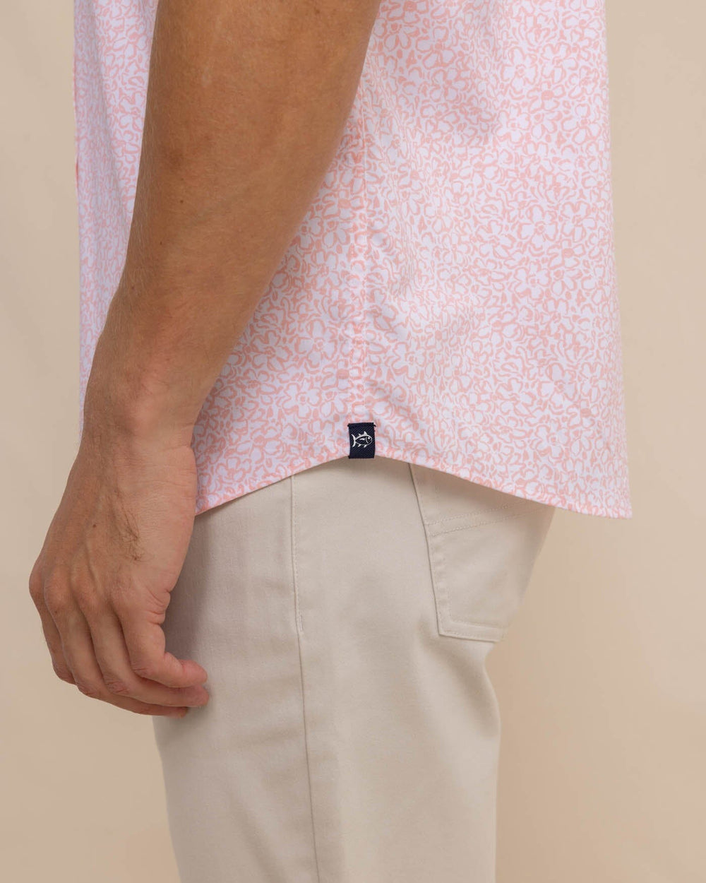 The detail view of the Southern Tide brrr Intercoastal That Floral Feeling Short Sleeve Sport Shirt by Southern Tide - Apricot Blush Coral