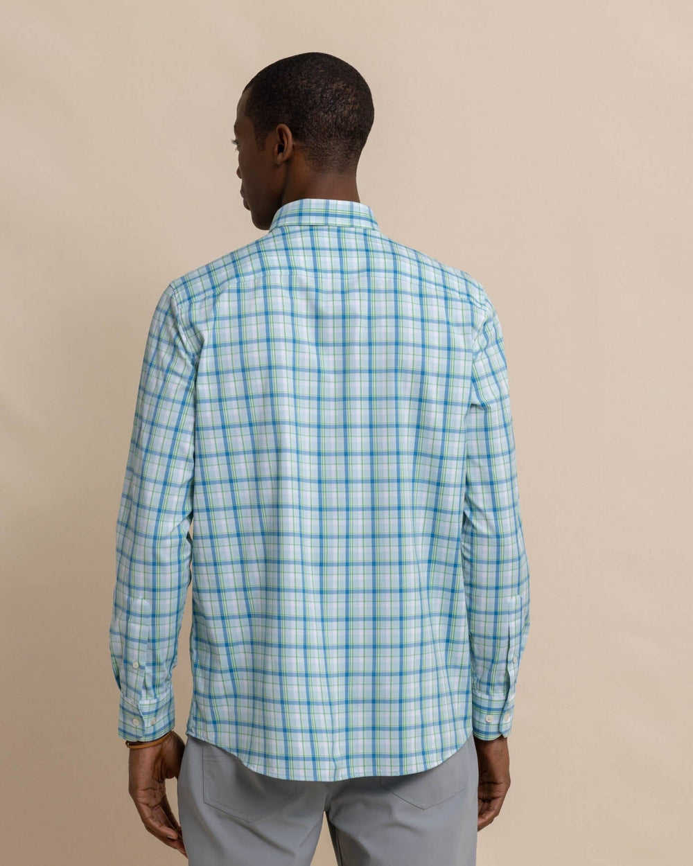 The back view of the Southern Tide brrr Whalehead Plaid Intercoastal Sport Shirt by Southern Tide - Chilled Blue