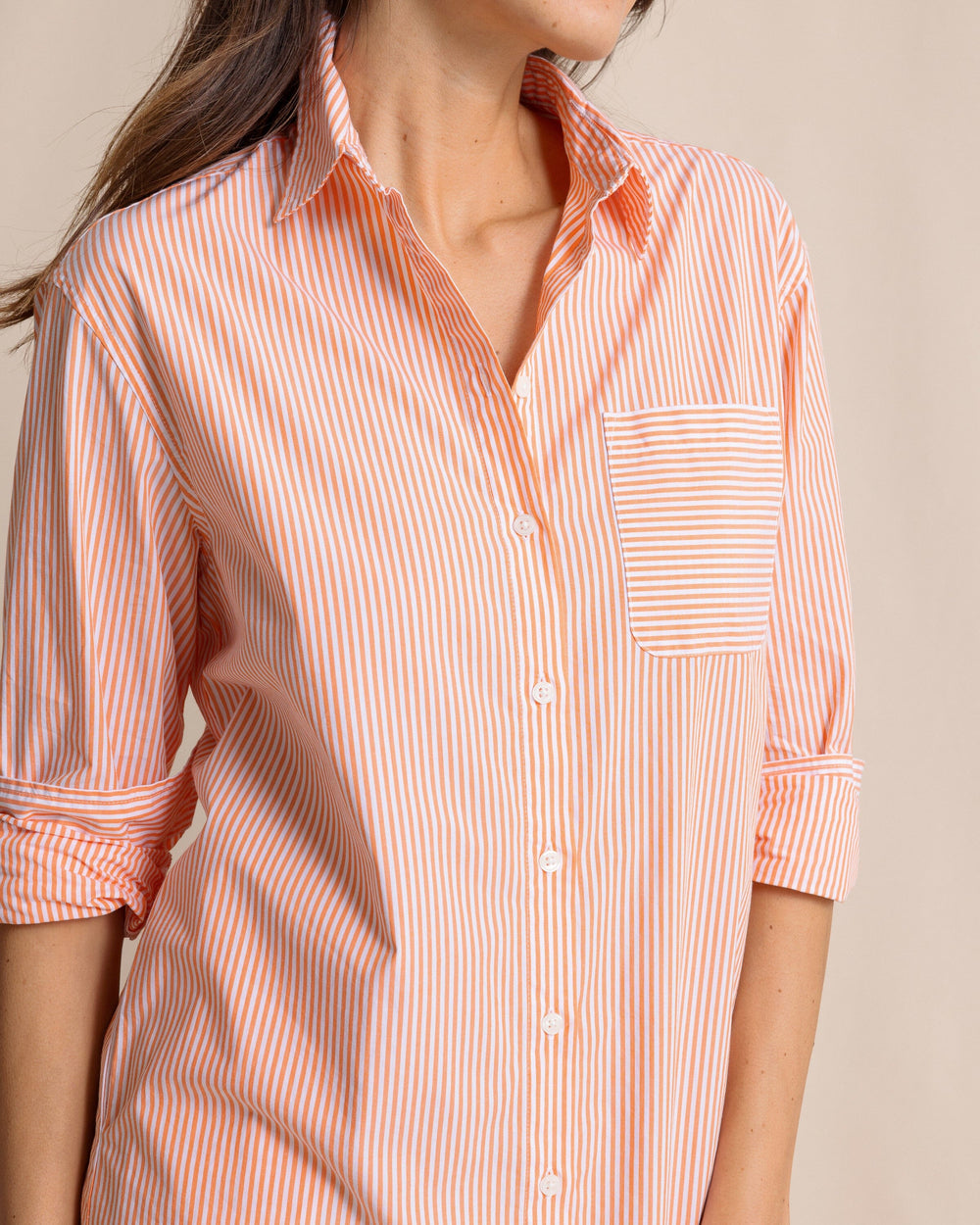The front detail view of the Southern Tide Cam Stripe Poplin Dress by Southern Tide - Peach Parfait