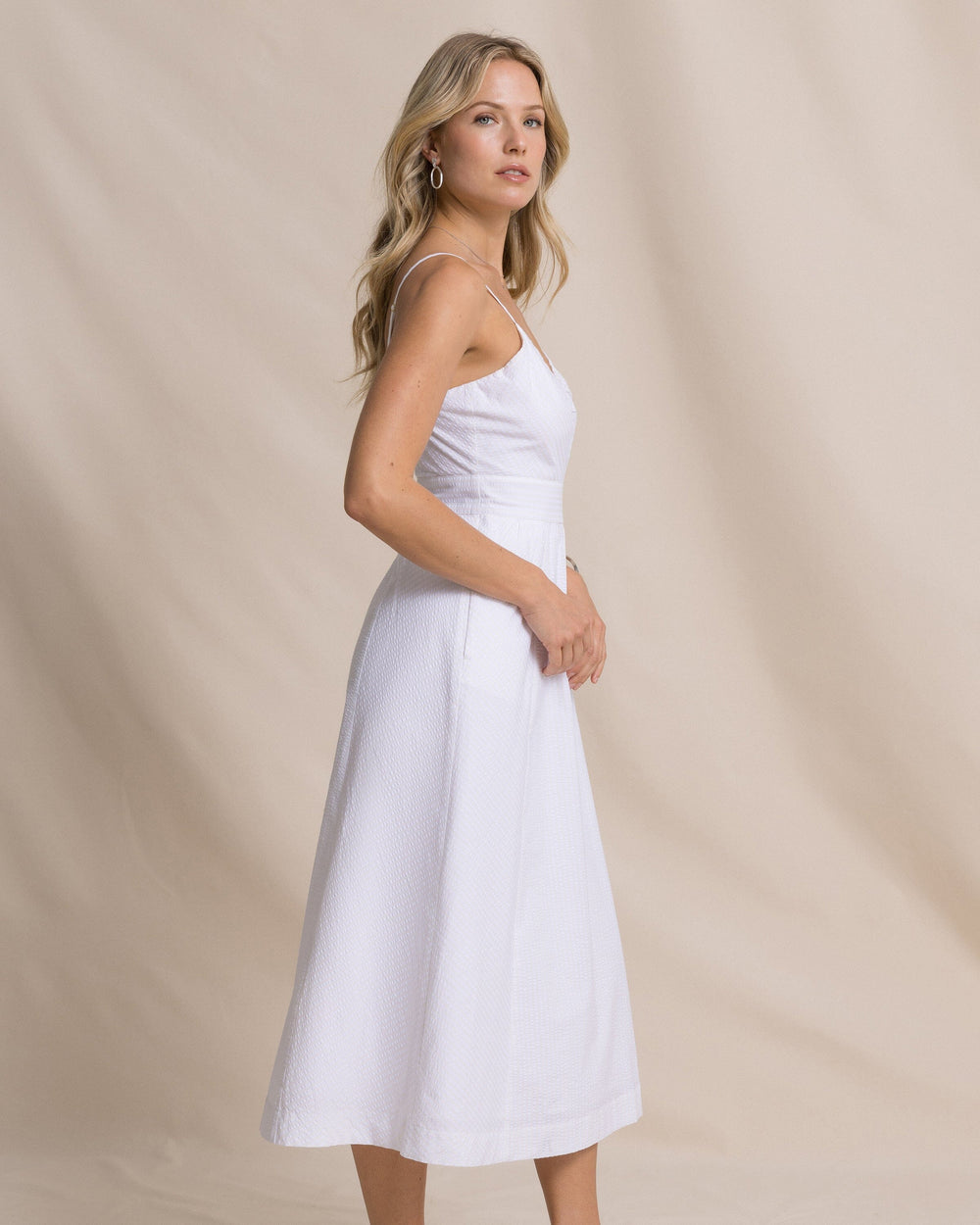 The side view of the Southern Tide Cami Seersucker Dress by Southern Tide - Classic White