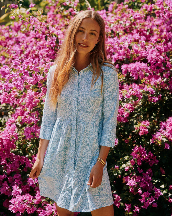 The lifestyle view of the Southern Tide Cara Brrr Forever Floral Dress by Southern Tide - Sky Blue