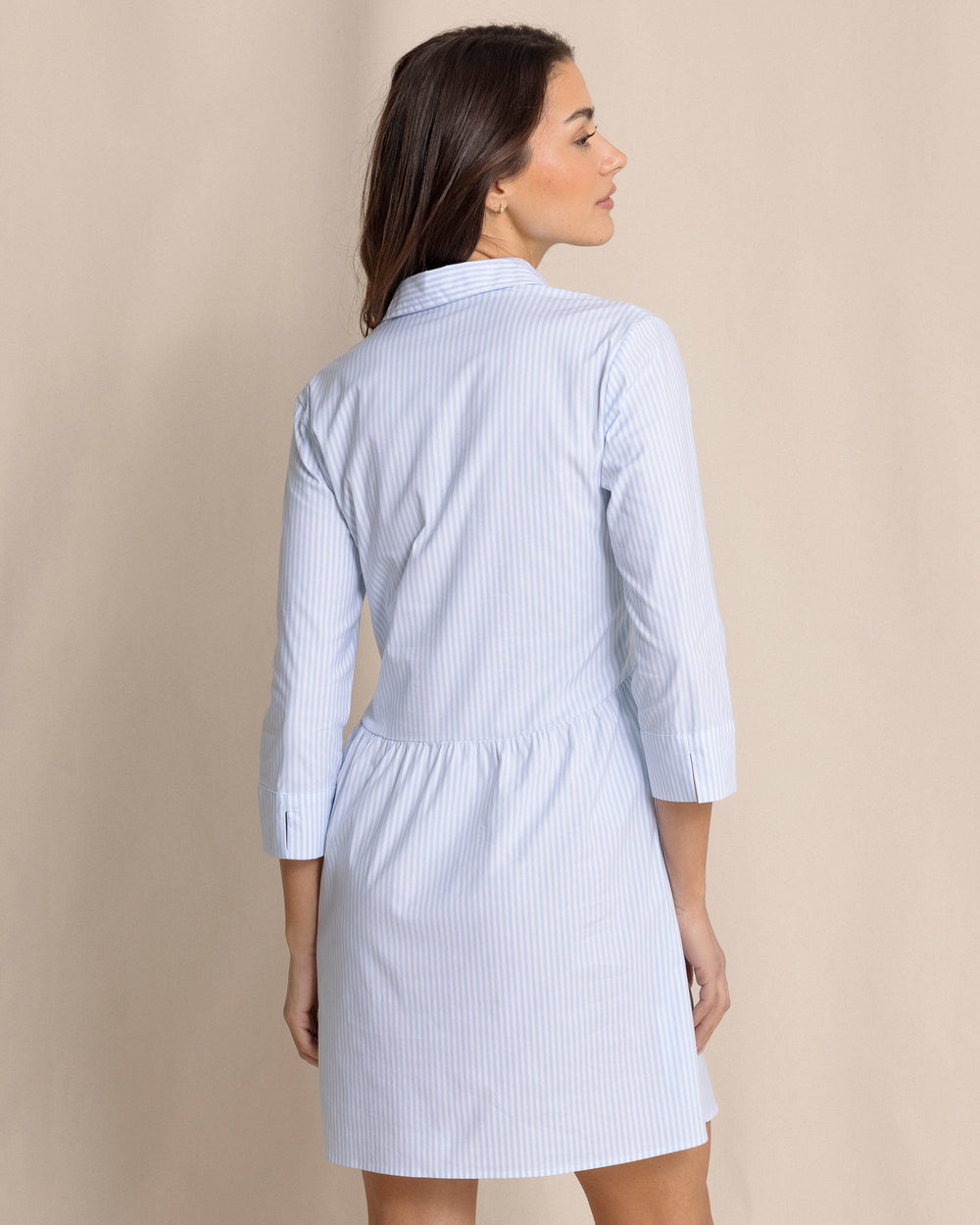 The back view of the Southern Tide Cara brrr°® Stripe Dress by Southern Tide - Cerulean