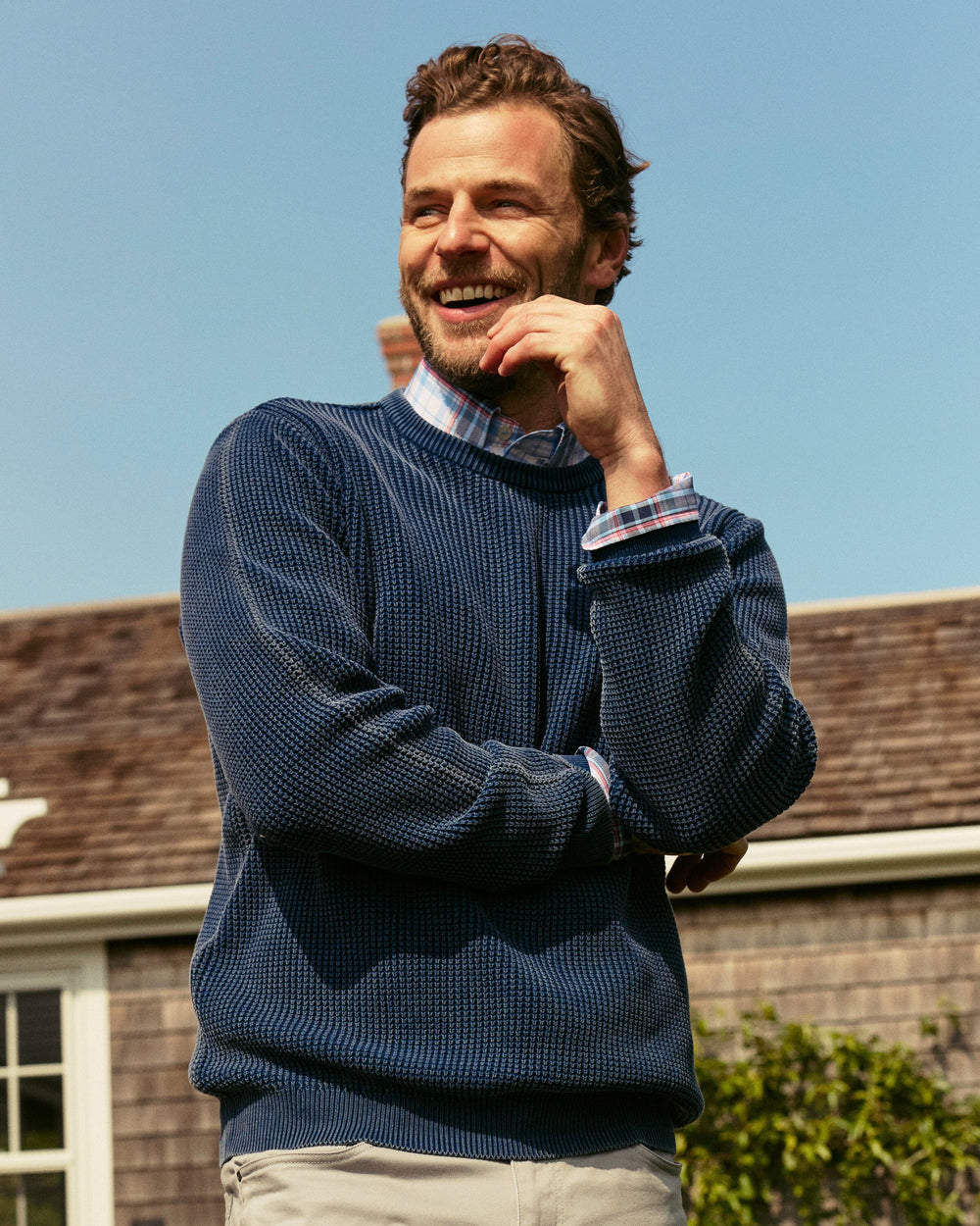 The lifestyle view of the Southern Tide Carrington Garment Dyed Crew Sweater by Southern Tide - Dress Blue
