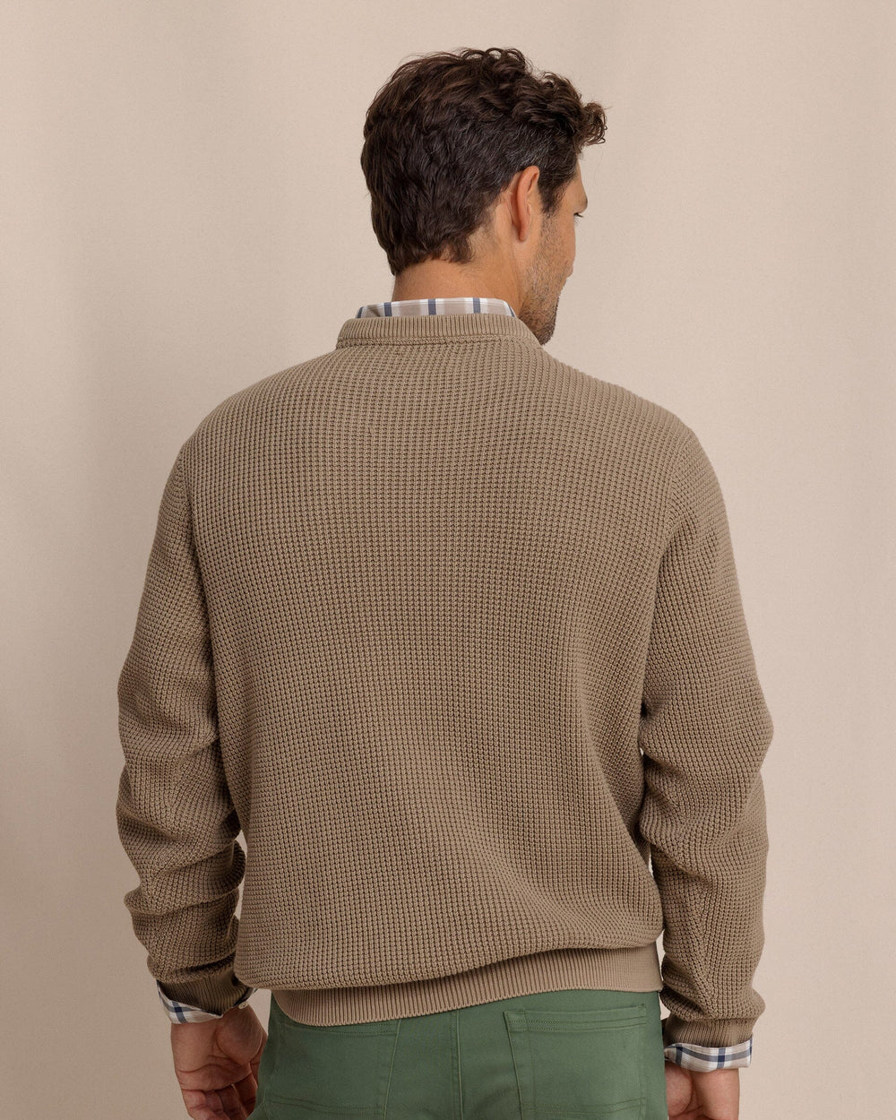 The back view of the Southern Tide Carrington Garment Dyed Crew Sweater by Southern Tide - Sandstone Khaki