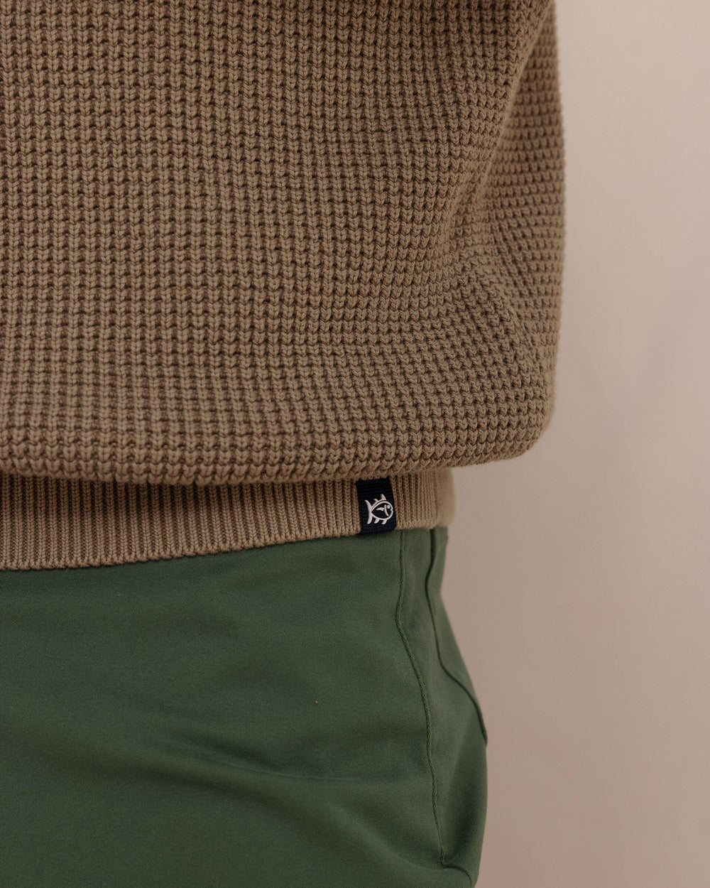 The detail view of the Southern Tide Carrington Garment Dyed Crew Sweater by Southern Tide - Sandstone Khaki