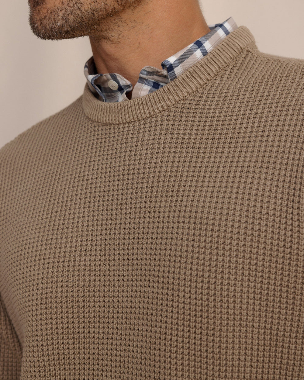 The detail view of the Southern Tide Carrington Garment Dyed Crew Sweater by Southern Tide - Sandstone Khaki