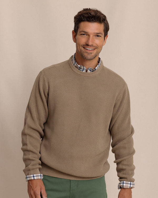 The front view of the Southern Tide Carrington Garment Dyed Crew Sweater by Southern Tide - Sandstone Khaki
