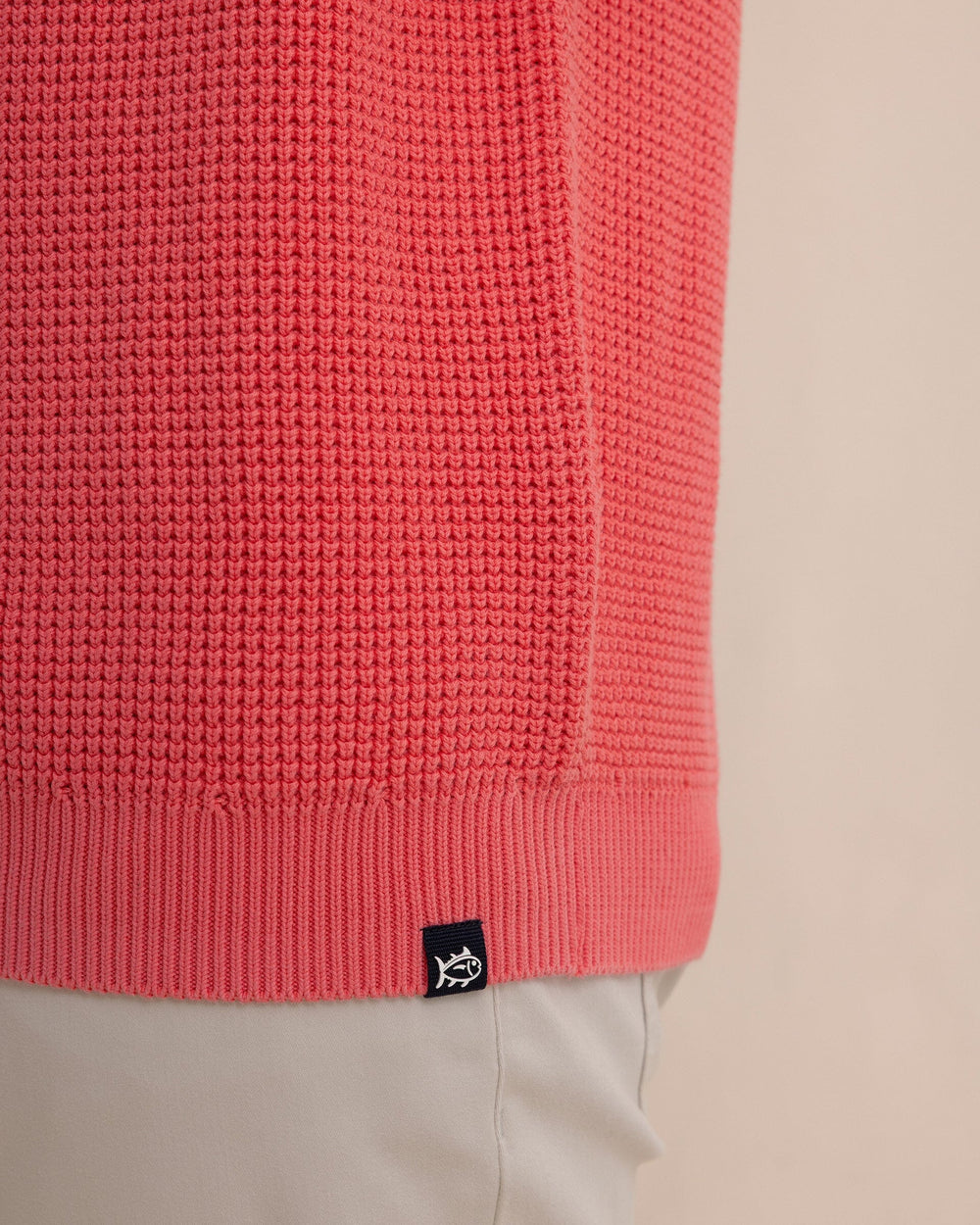 The detail view of the Southern Tide Carrington Garment Dyed Crew Sweater by Southern Tide - Snapper