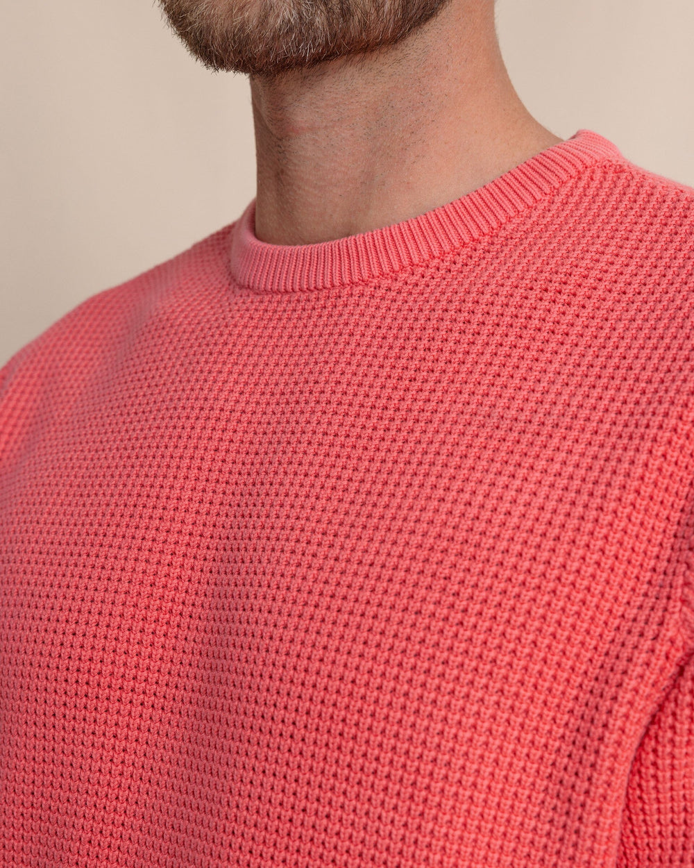 The detail view of the Southern Tide Carrington Garment Dyed Crew Sweater by Southern Tide - Snapper