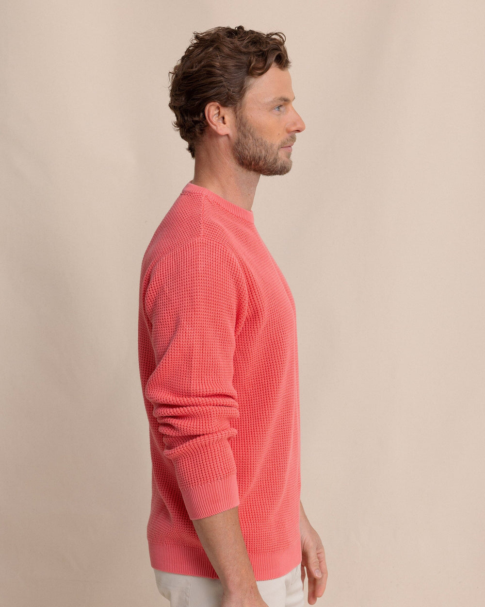 The side view of the Southern Tide Carrington Garment Dyed Crew Sweater by Southern Tide - Snapper
