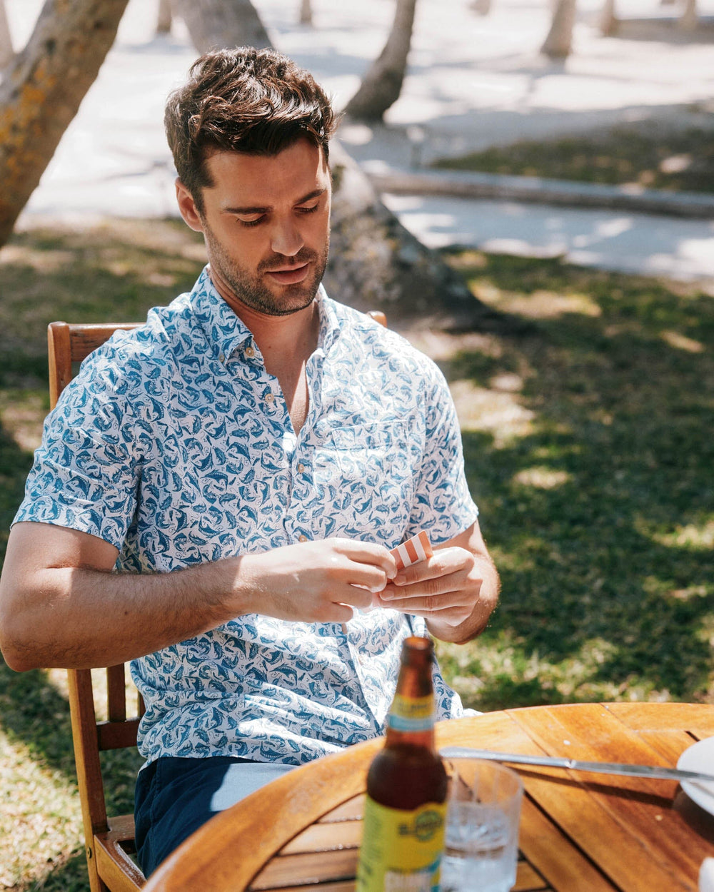 The lifestyle view of the Southern Tide Catch You Later Short Sleeve Long Sleeve Button Down Sport Shirt by Southern Tide - Clearwater Blue